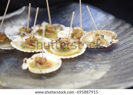 Scallops. Spanish Food. Tapas. Party appetizers. Horizontal format. Close up picture. 
