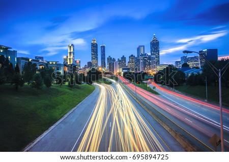 Beautiful Atlanta City View with Light Trails from Jackson Bridge during Blue hour Royalty-Free Stock Photo #695894725