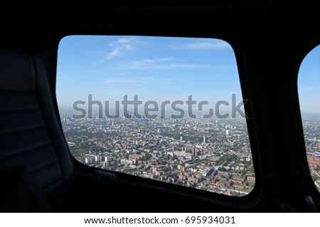 aerial view of London seen through a helicopter window, UK