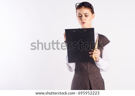 Young beautiful woman on white background, documents, teacher.