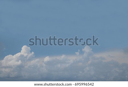 blue sky background with clouds. The sky (or celestial dome) is everything that lies above the surface of the Earth, including the atmosphere and outer space.