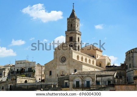 Beautiful view of Matera Cathedral from a balcony of Matera old town, UNESCO World Heritage Site and European Capital of Culture 2019, Matera, Basilicata, Italy Royalty-Free Stock Photo #696004300