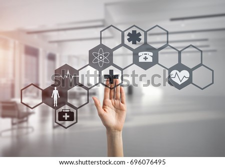 Hand of woman touching icon of media screen with medicine concept