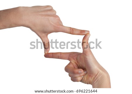 Woman hands making frame gesture isolated on white background with copy space