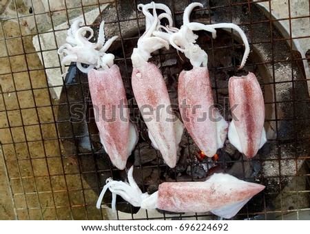 Fresh squid, grilled charcoal stove