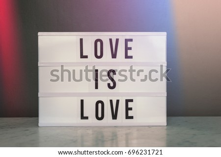 lightbox with "love is love" and rainbow. Australia is currently debating and readying to vote on Gay Marriage. 