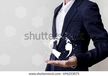 Future of technology network concept,Businessman holding worldwide network symbols.