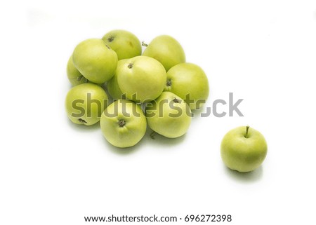 Green apples a bunch isolated on the white background with the shadow.