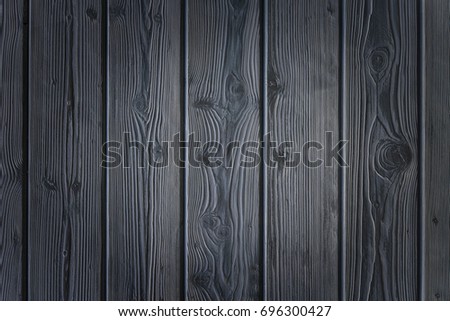 Vertical old wooden planks texture. Natural photo.