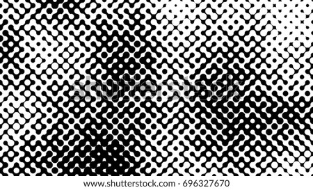 Abstract halftone pattern formed by black and white circles of different size.Vector illustration of a dotted background