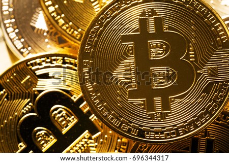 Lot of golden bitcoin coins - virtual crypto money of the world