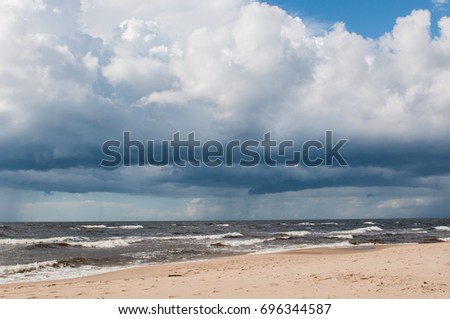 Storm and cloudy sky and wavy on the Sea Baltic, Saulkrasti, Latvia