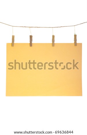 Orange blank paper sheet on a clothes line. Isolated on white background.