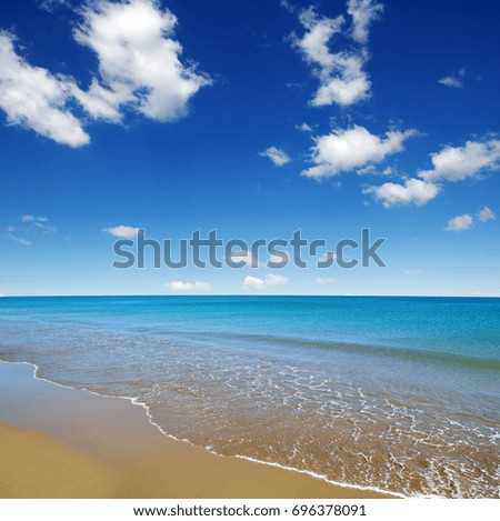 beach and sea on sky