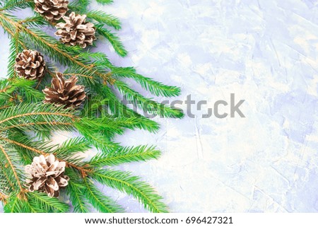 Christmas background with spruce, cones and toys