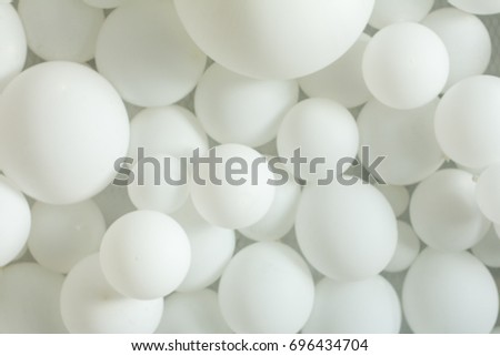 a wall of white balloons