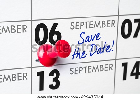 Wall calendar with a red pin - September 06