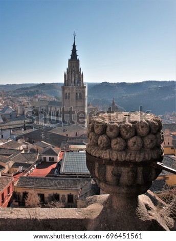 View of the gotic cathedral of Toledo,Photograph of the rooftops of the city of Toledo, Castilla La Mancha, Spain, from the tower of the Jesuit church, San Ildefonso,View of the streets of the city 