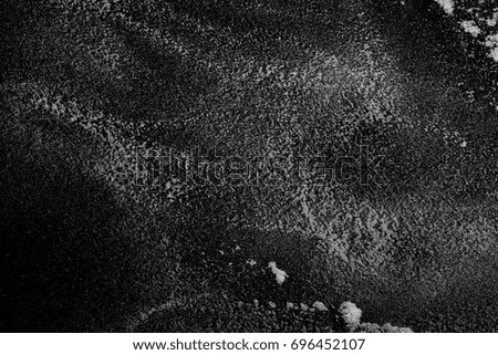 White powder exploding isolated on black background
