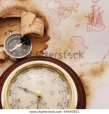 Compass and barometer on old chart of North Europe Royalty-Free Stock Photo #69645811