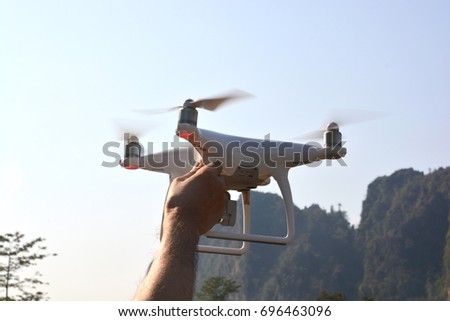 Drone ready to fly, The drone with the professional camera takes pictures.