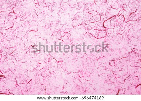 Abstract pink mulberry paper texture used for background.