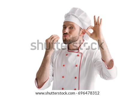 handsome chef showing okay sign isolated on white