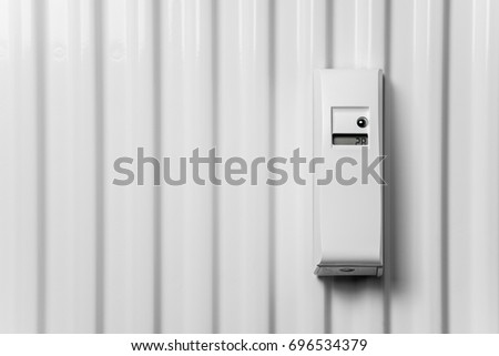 Modern heat counters, heat measuring instrument on a white radiator (Thermoregulator) Royalty-Free Stock Photo #696534379