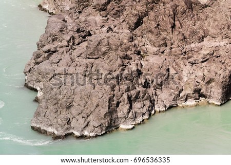 Top view of the cliffs and the water of the river