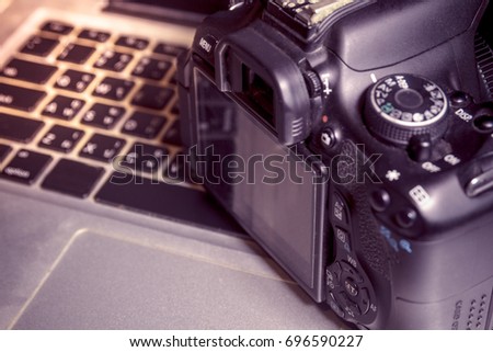  Digital camera Used to work Laptop and Notebook Computer , photographer used for digital camera DSLR photography.