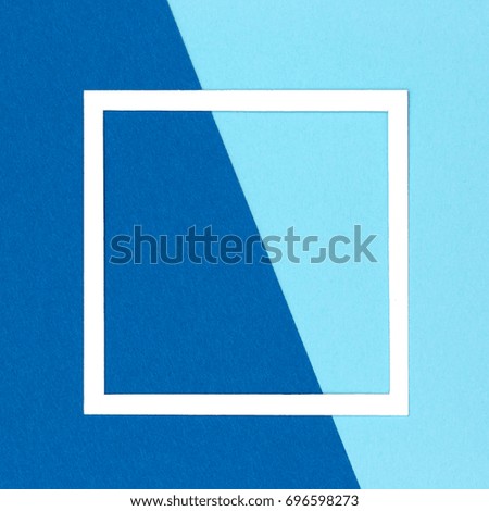 Empty frame flat lay on color paper background with copy space. Minimal concept.