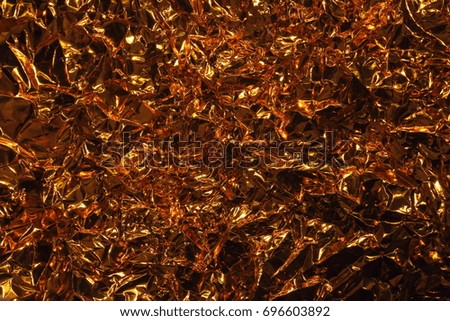 Golden metal background, crumpled texture