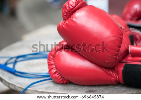 boxing glove on a wooden surface