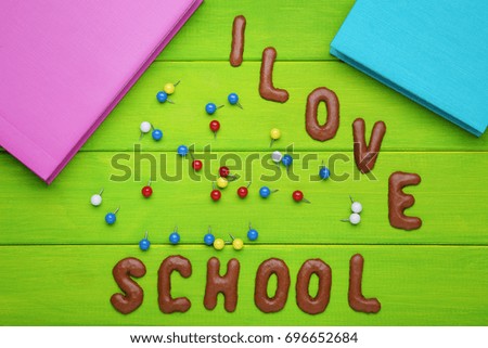 I Love School written by chocolate cookies alphabet with notebooks and pins