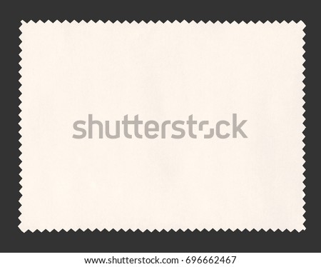 off white paper sample with zig zag border cut with pinking shears Royalty-Free Stock Photo #696662467