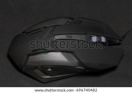 gaming computer mouse on gray background\gaming mouse\isolated objects, computer peripherals