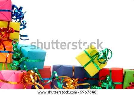 Colorful gifts with shining ribbons on white