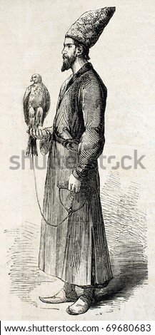 Antique illustration of a falconer with his hawk  in Isfahan, Persia. Original illustration, engraved on drawing of E. Duhousset, was published on L'Illustration, Journal Universel, Paris, 1860