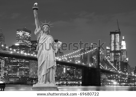 Brooklyn Bridge, Manhattan Skyline and The Statue of Liberty at Night Lights, New York City