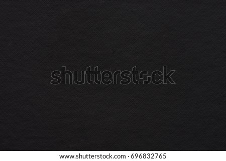 Empty black paper texture. Textured dark paper background