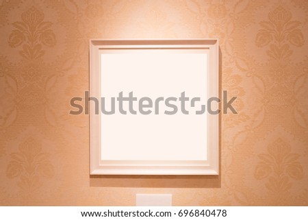 close up of picture frame on the wall