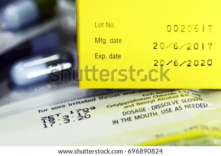 Manufacturing date and expiry date on some pharmaceutical packaging. Royalty-Free Stock Photo #696890824