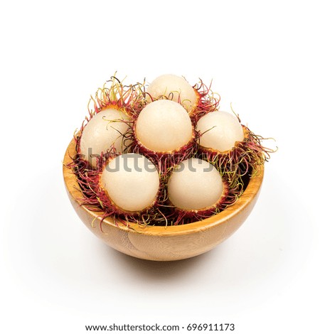 Fresh Rambutan from Rayong Thailand in wooden bowl isolated on white background, Sweet delicious fruit