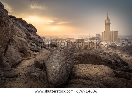 Makkah Sunset, Landscape view of clock tower from a mountain near this Holy region Royalty-Free Stock Photo #696914836