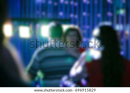 Blur people eating and talking in dining room, restaurant party celebration concept.