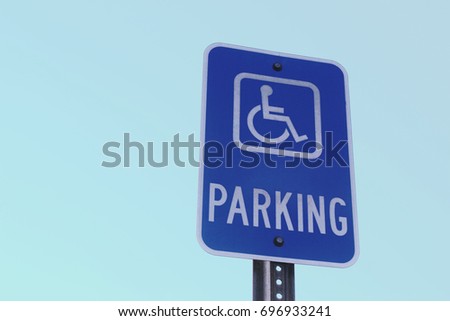 Handicapped accessibility parking sign