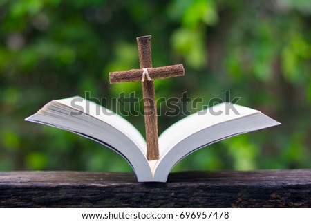 Wood cross or religion symbol shape over wood  background for God.