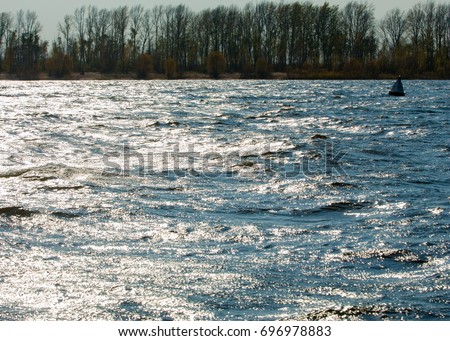 storm water, the river in the fall. Waves on water river texture. rapid river. Storm surges. Kama River