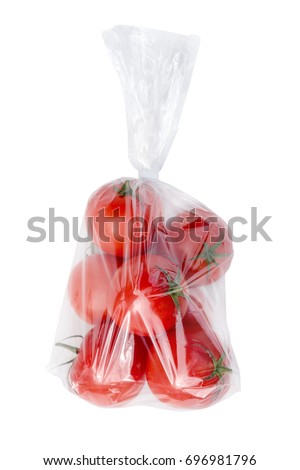 Tomatoes in plastic bag. Royalty-Free Stock Photo #696981796