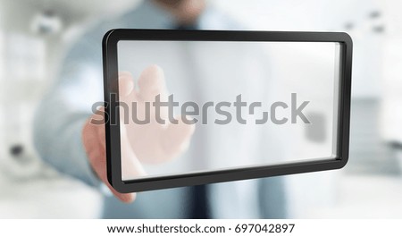 Businessman on blurred background using digital screens tablet 3D rendering